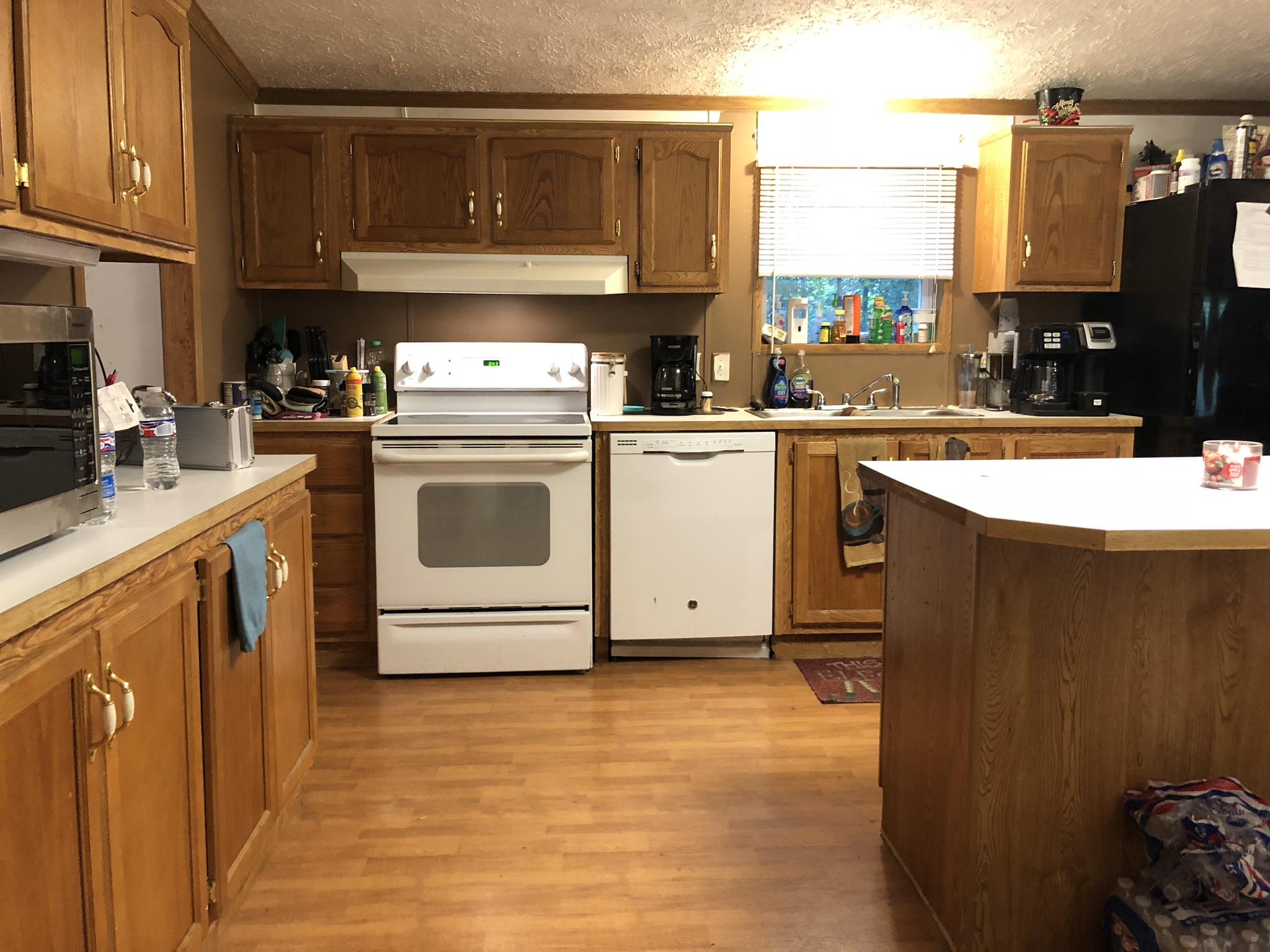 399 Brock Road Charlotte, TN 37036 - Photo 6 of 22 Large kitchen with lots of cabinet space!
