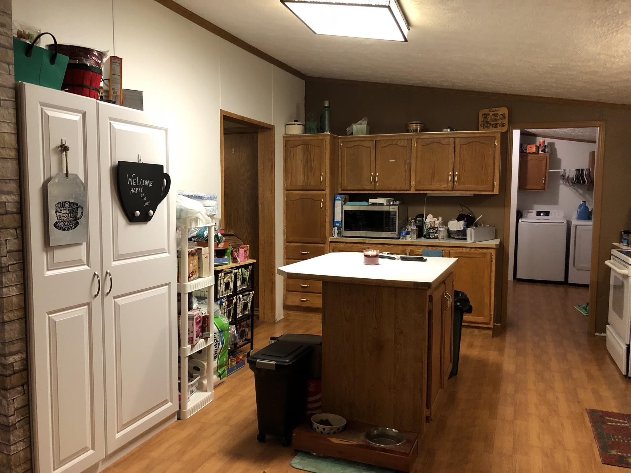 399 Brock Road Charlotte, TN 37036 - Photo 8 of 22 Extra storage in kitchen (unit can stay with home).