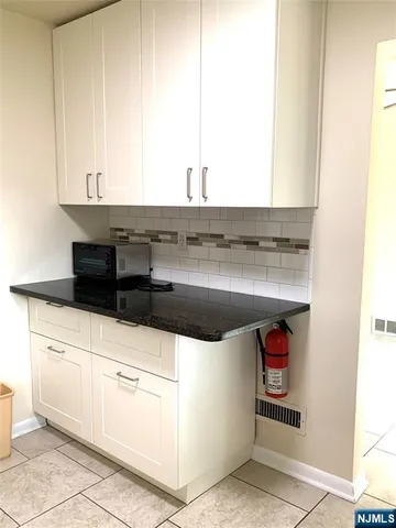 a utility room with washer and dryer