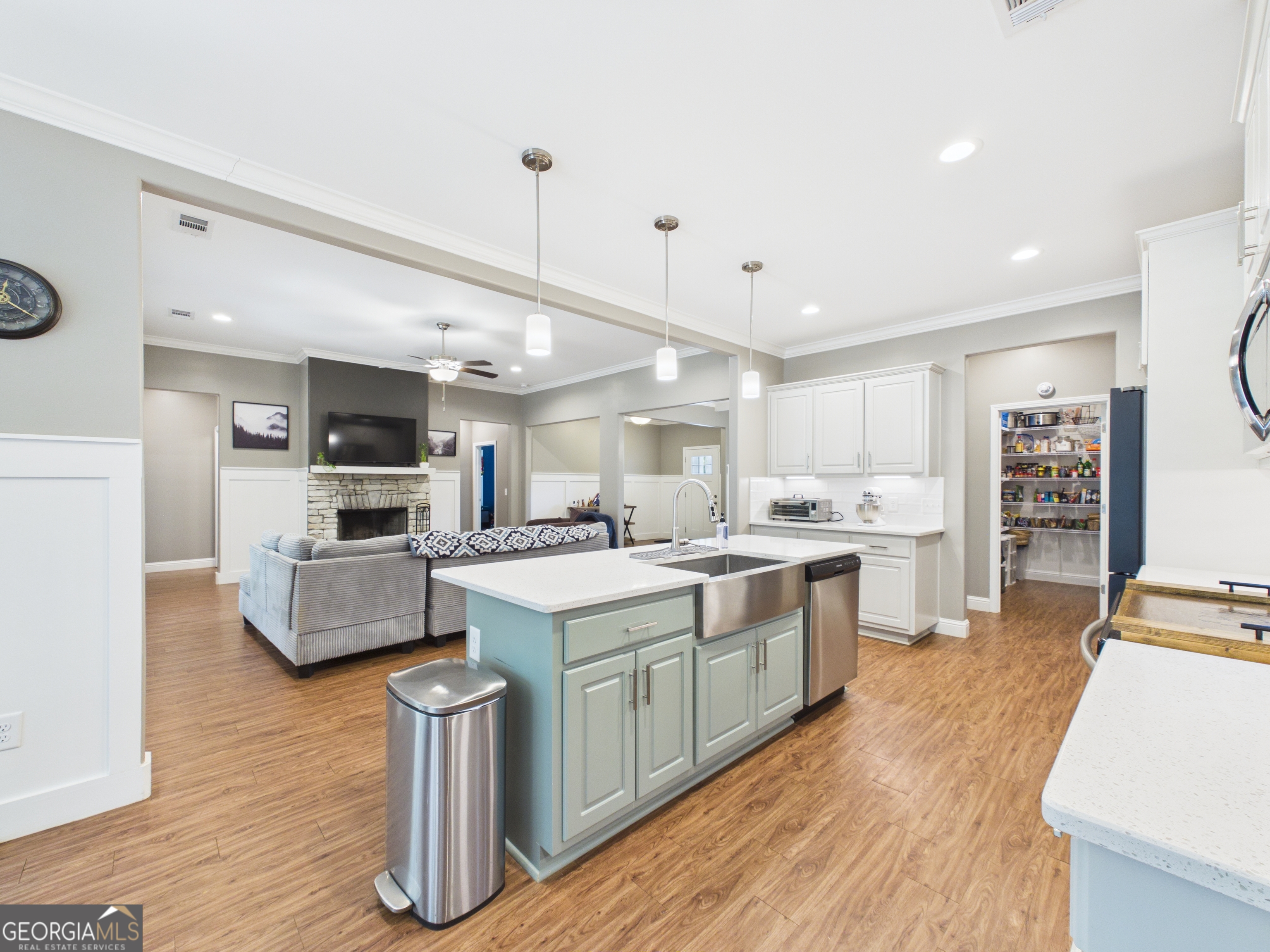143 Terry Lane Fortson, GA 31808 - Photo 13 of 46 a large kitchen with stainless steel appliances kitchen island granite countertop a large center island and a sink