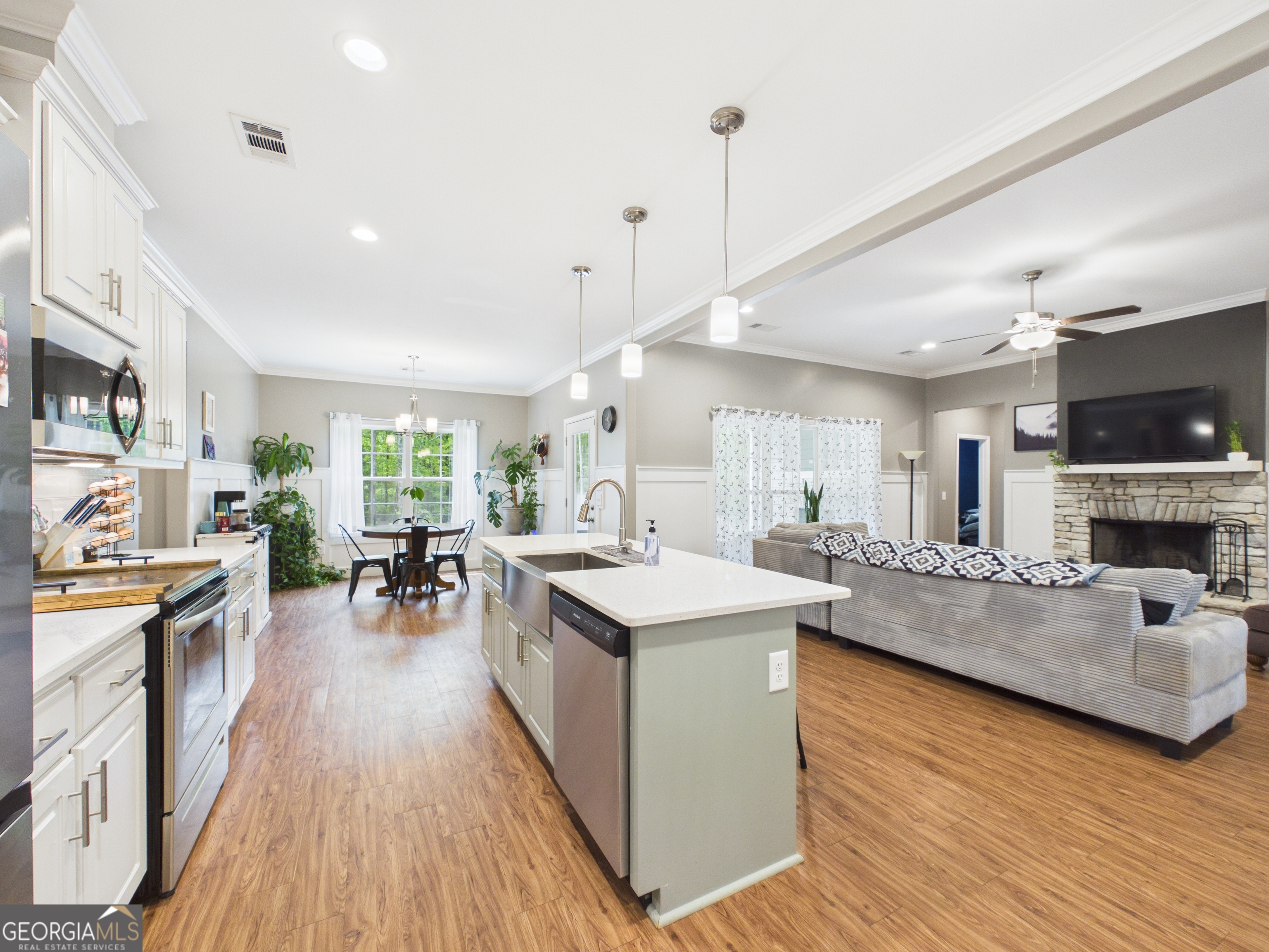 143 Terry Lane Fortson, GA 31808 - Photo 14 of 46 a view of living room kitchen with stainless steel appliances granite countertop living room and living room view