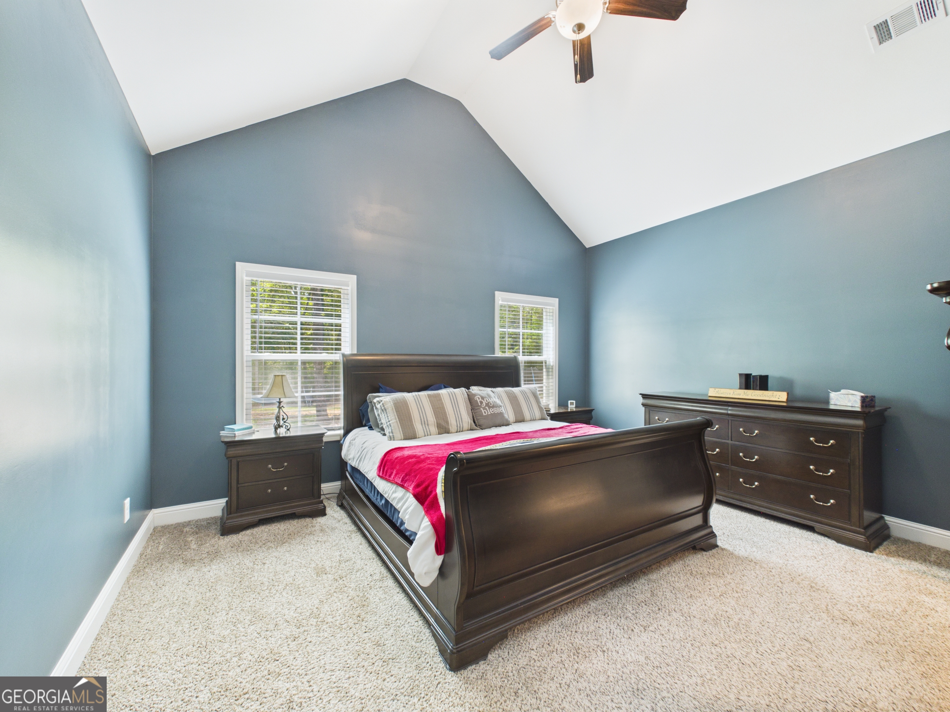 143 Terry Lane Fortson, GA 31808 - Photo 18 of 46 a bedroom with a bed and a window