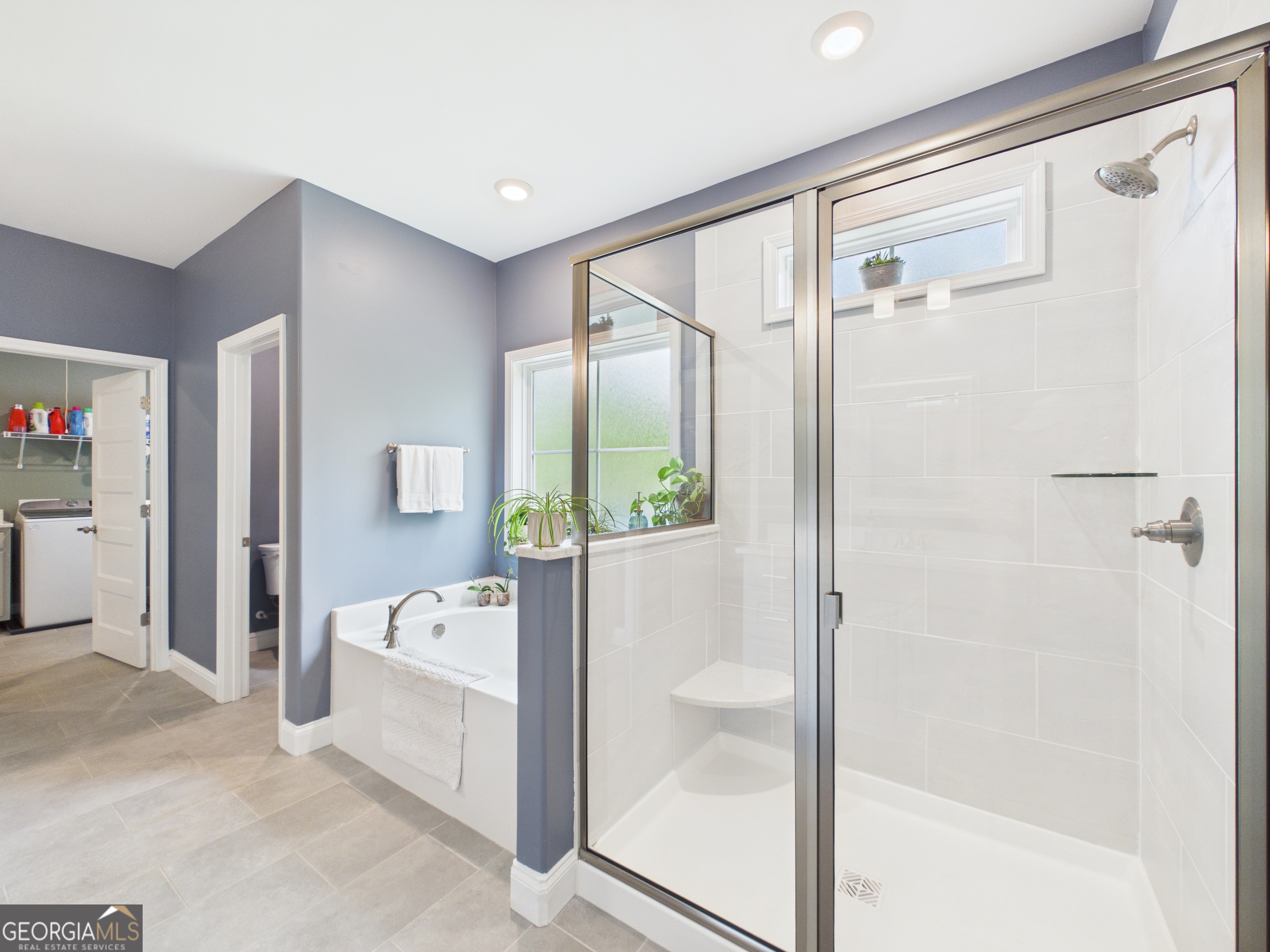 143 Terry Lane Fortson, GA 31808 - Photo 21 of 46 a bathroom with a tub shower and sink