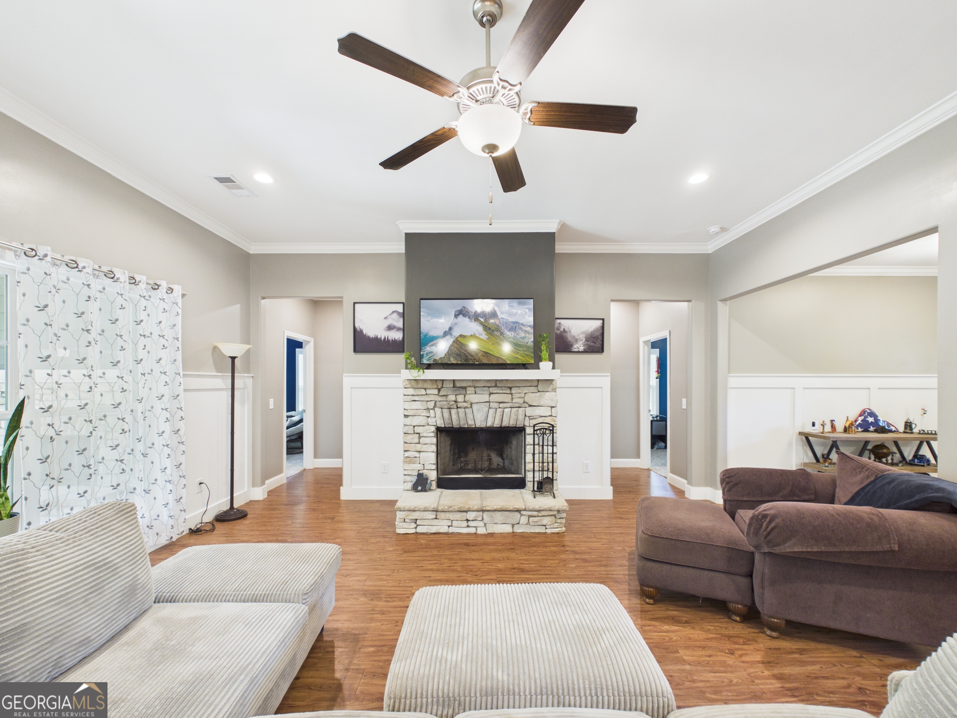 143 Terry Lane Fortson, GA 31808 - Photo 30 of 46 a living room with furniture and a fireplace