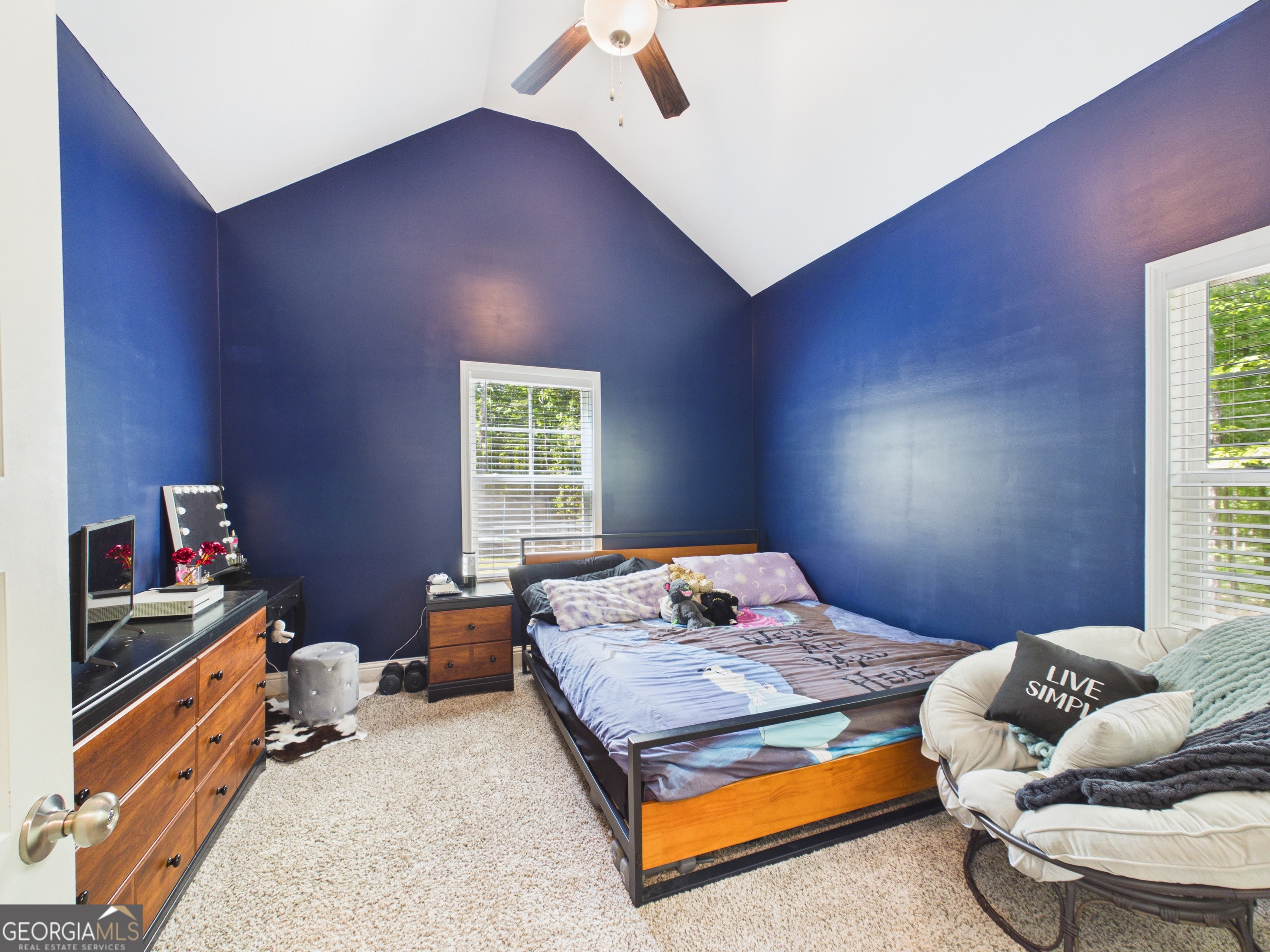 143 Terry Lane Fortson, GA 31808 - Photo 31 of 46 a bedroom with a bed and a window