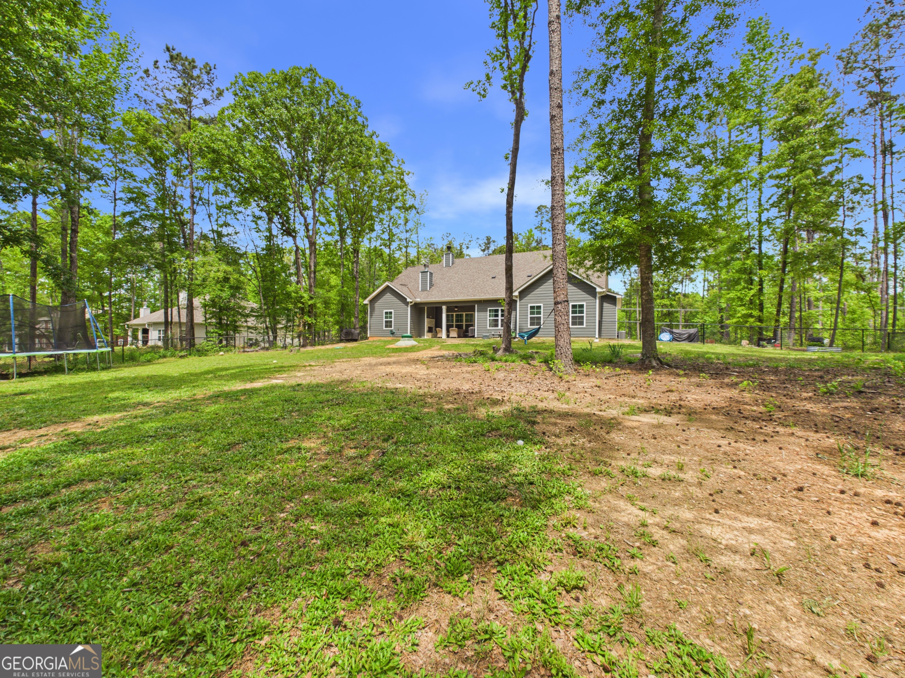 143 Terry Lane Fortson, GA 31808 - Photo 40 of 46 a house view with a garden space