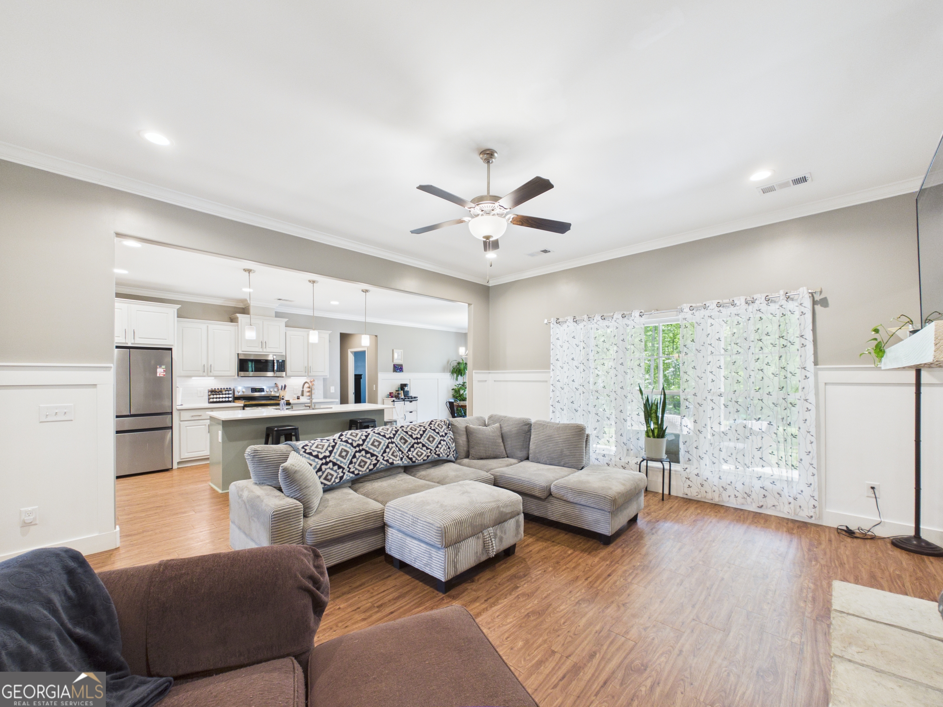 143 Terry Lane Fortson, GA 31808 - Photo 5 of 46 a living room with furniture and a large window