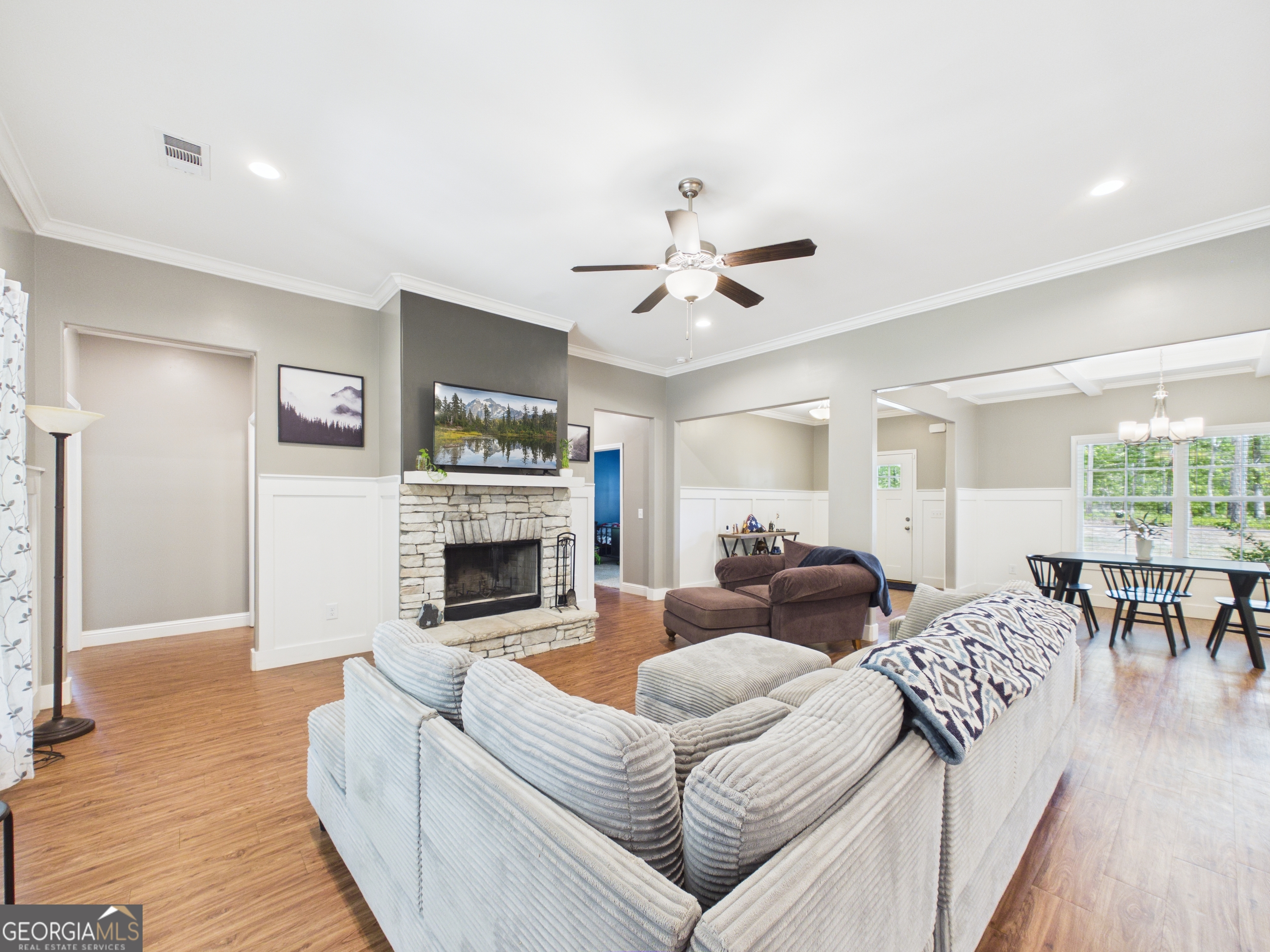 143 Terry Lane Fortson, GA 31808 - Photo 7 of 46 a living room with fireplace furniture and a wooden floor