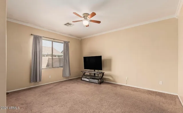 a view of workspace with furniture and window