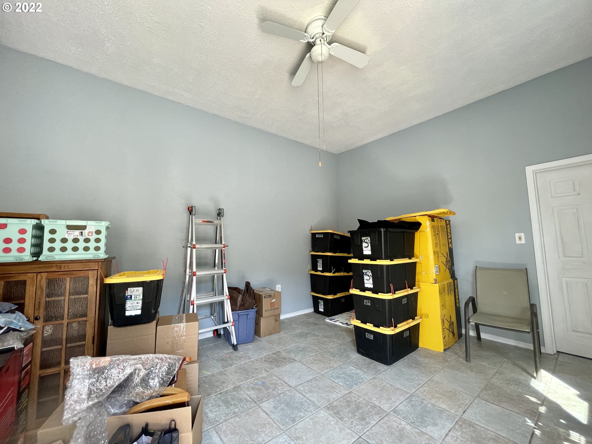 307 Evergreen Ridge Road Riddle, OR 97469 - Photo 20 of 29 a bedroom with furniture and natural light