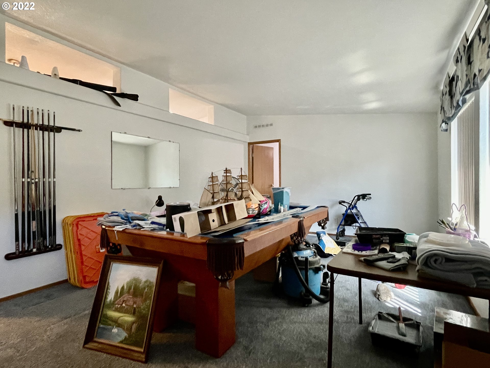 307 Evergreen Ridge Road Riddle, OR 97469 - Photo 5 of 29 a room with furniture a rug and a window