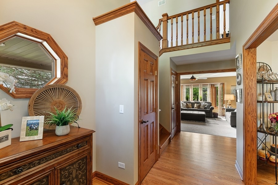 709 South Anderson Road New Lenox, IL 60451 - Photo 3 of 28 a living room with furniture and a potted plant