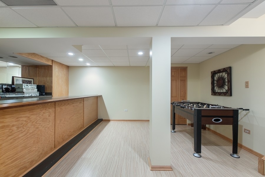 709 South Anderson Road New Lenox, IL 60451 - Photo 22 of 28 a view of kitchen with furniture and wooden floor