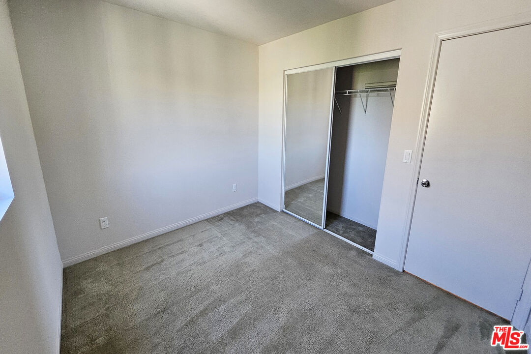 7245 Maple Road Van Nuys, CA 91405 - Photo 13 of 45 an empty room with closet
