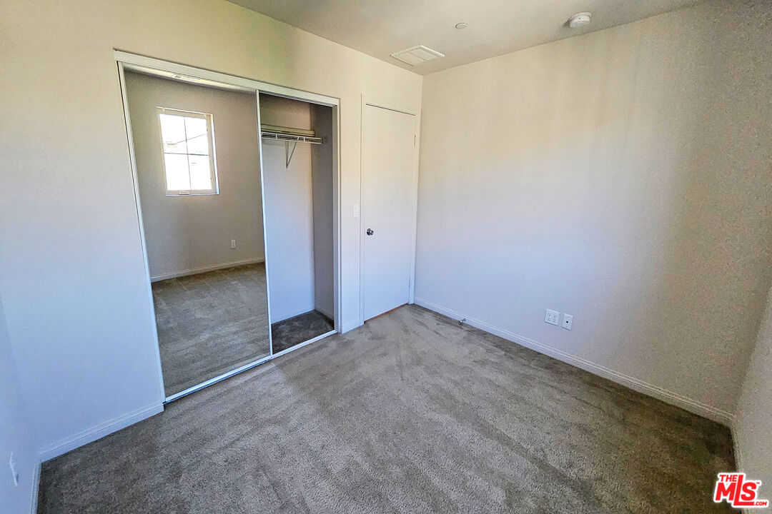 7245 Maple Road Van Nuys, CA 91405 - Photo 14 of 45 an empty room with windows