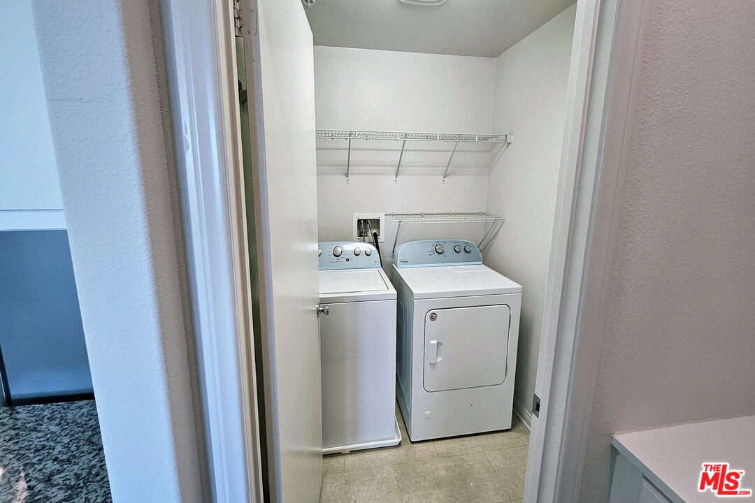 7245 Maple Road Van Nuys, CA 91405 - Photo 27 of 45 a utility room with dryer and washer