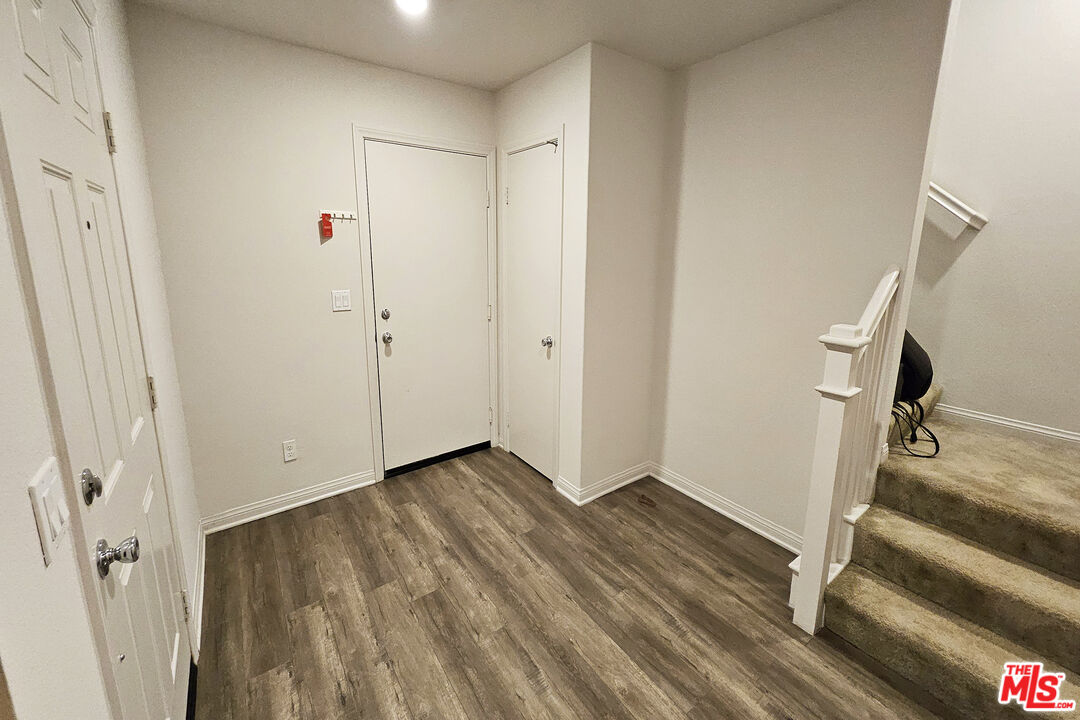 7245 Maple Road Van Nuys, CA 91405 - Photo 37 of 45 a view of an entryway with wooden floor