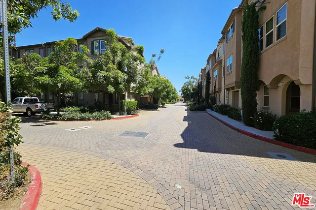 a view of a street with houses