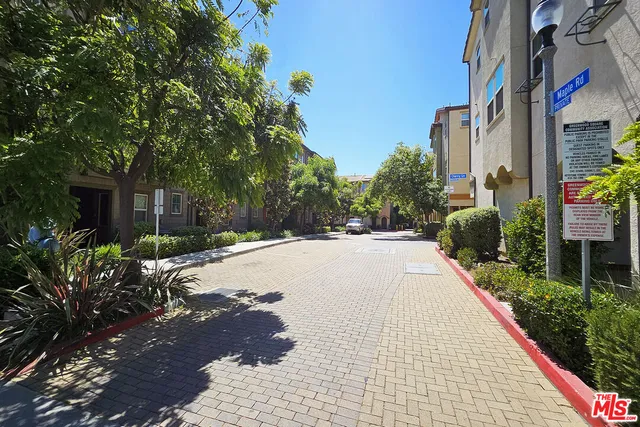 a view of a garden with patio