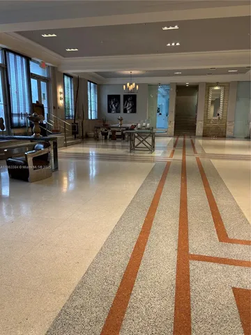 a view of a living room and dining room