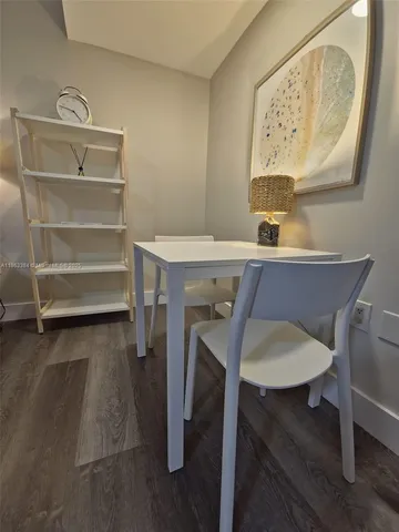 a view of a workspace with furniture