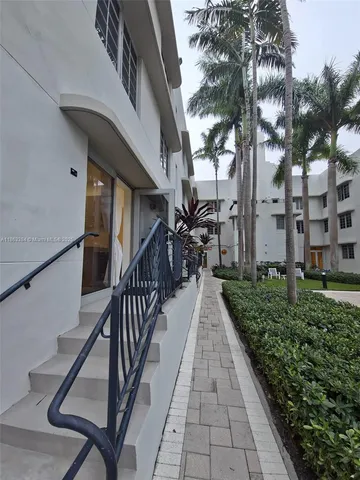a view of a pathway with a house