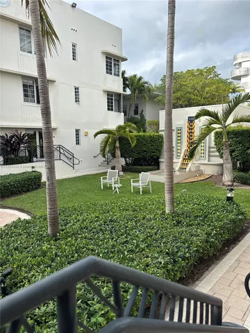 a view of a porch with a yard
