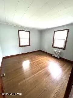 a kitchen with a stove a sink and a refrigerator