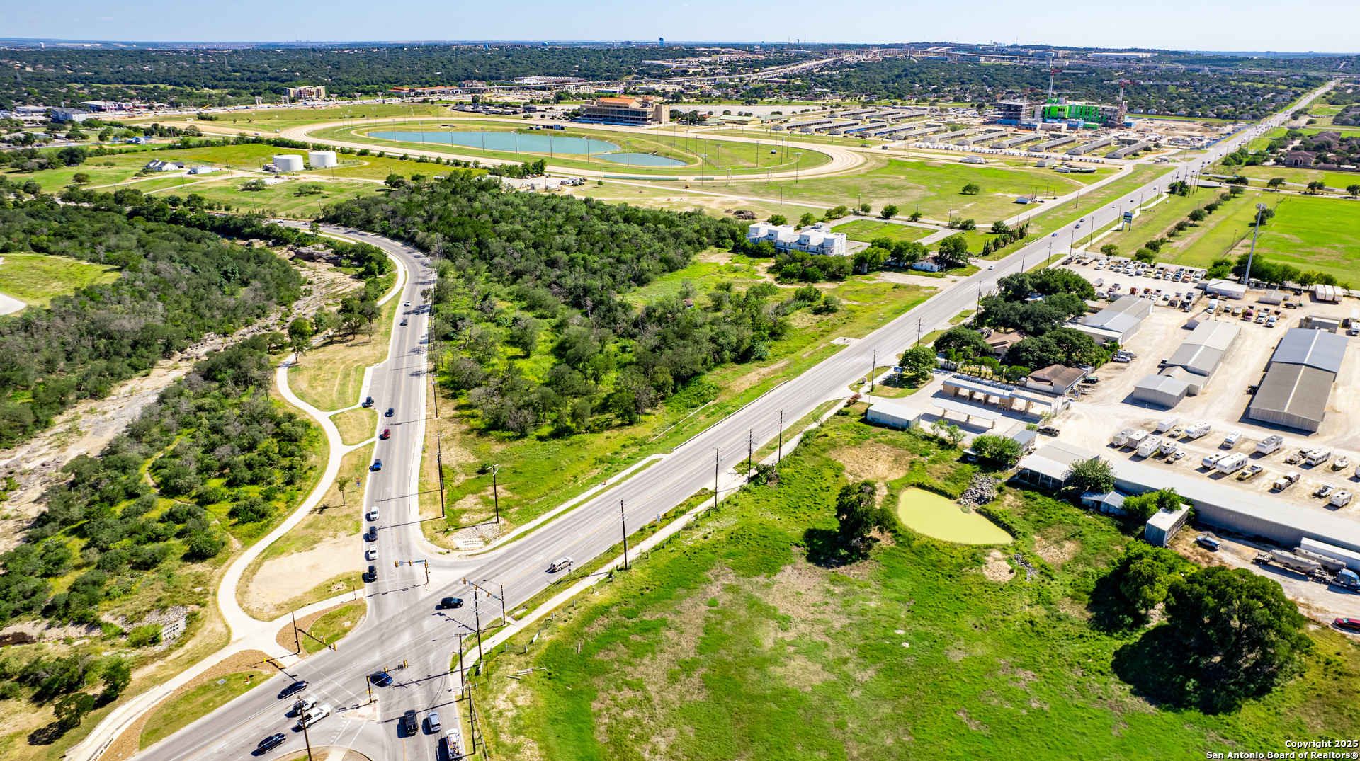 16874 Lookout Road Selma, TX 78154 - Photo 3 of 8 a view of a swimming pool and an outdoor space