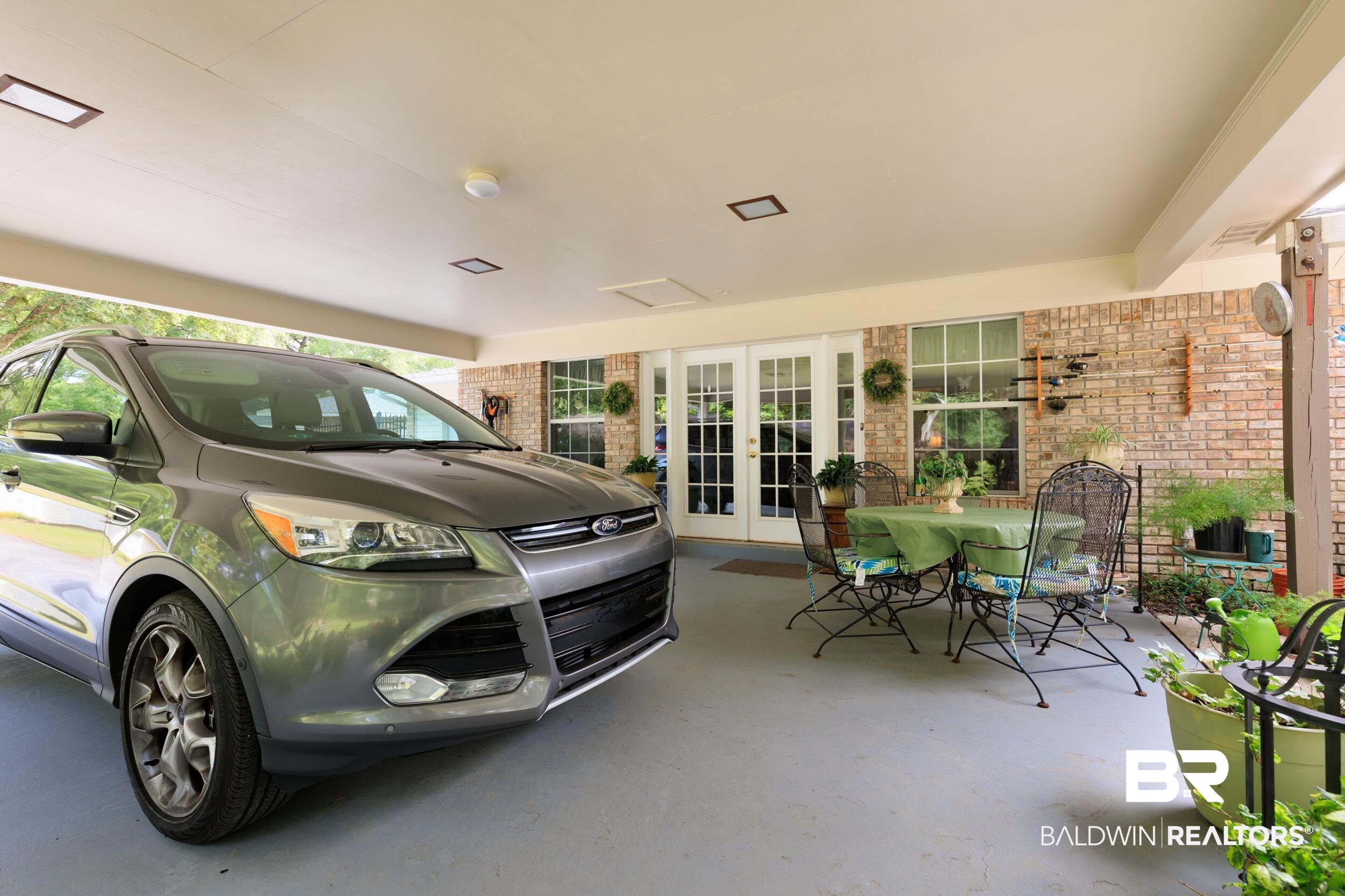 1367 Spring Valley Court Mobile, AL 36693 - Photo 29 of 29 Covered carport with recessed lighting and a painted concrete floor