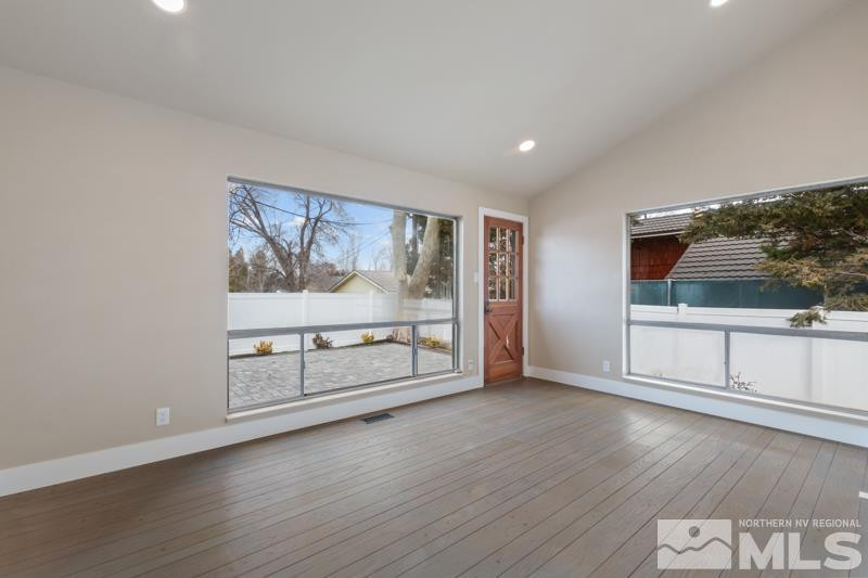 995 Skyline Boulevard Reno, NV 89509 - Photo 26 of 34 a view of a livingroom with wooden floor