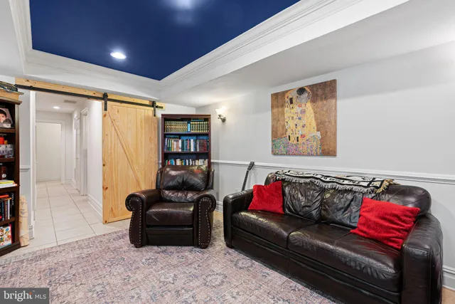 a living room with furniture and a couch