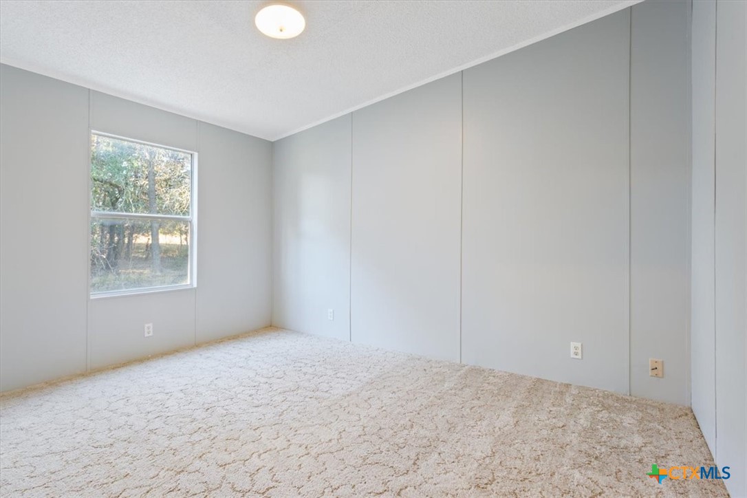 706 County Road 3376 Kempner, TX 76539 - Photo 25 of 31 a view of an empty room with a window