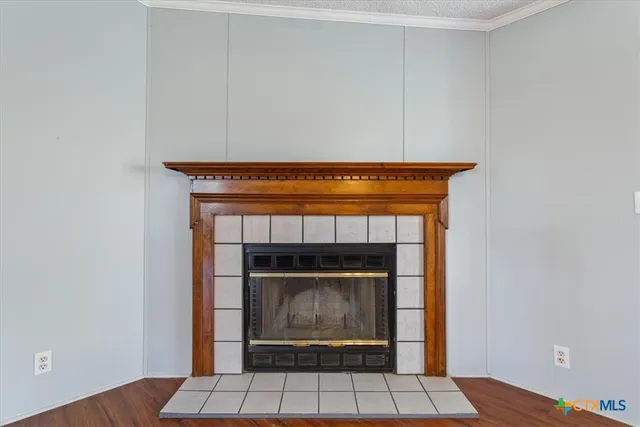 a living room with a fireplace