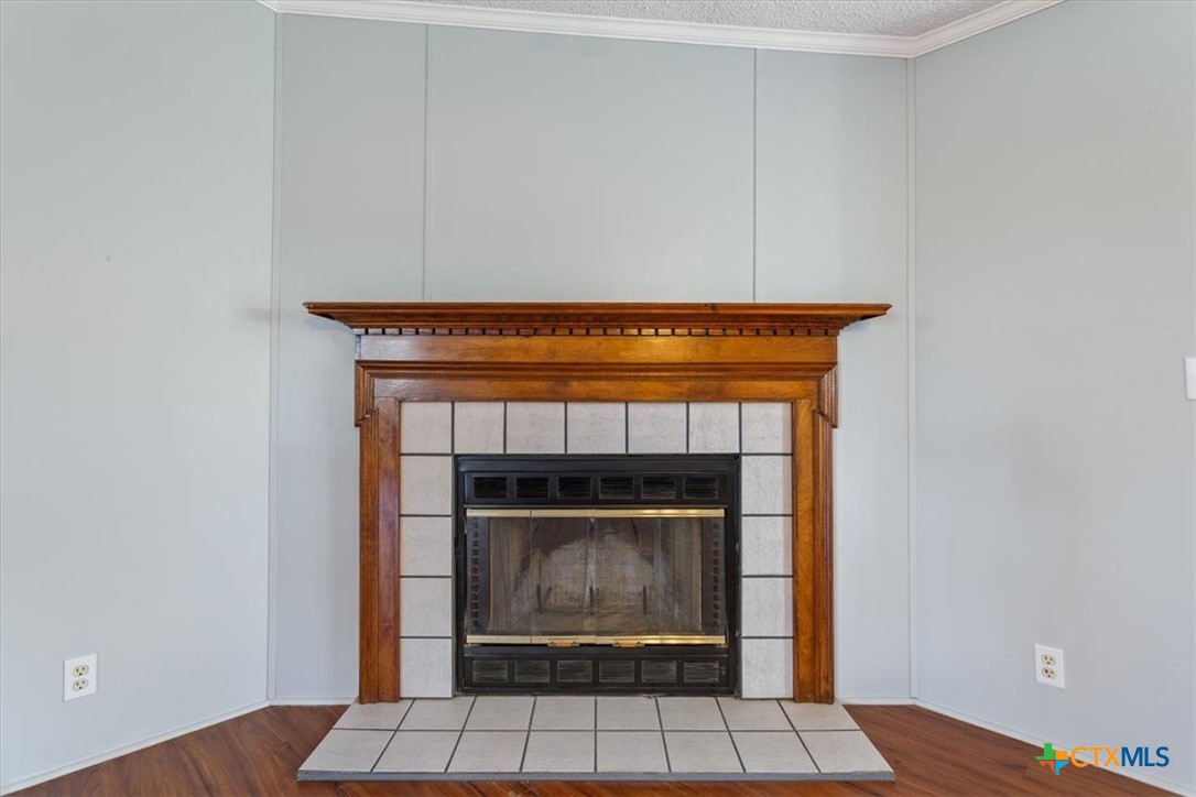 706 County Road 3376 Kempner, TX 76539 - Photo 10 of 31 a living room with a fireplace