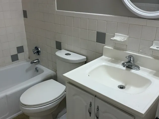 a bathroom with a sink and a toilet