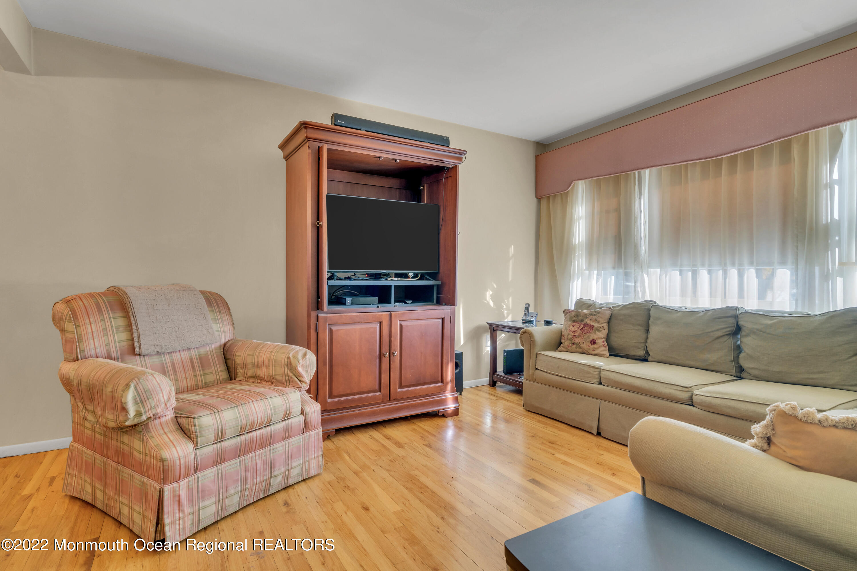 510 Diamond Road Jackson, NJ 08527 - Photo 8 of 36 a living room with furniture and a flat screen tv