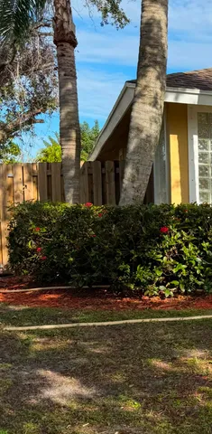 a view of swimming pool with outdoor seating and yard