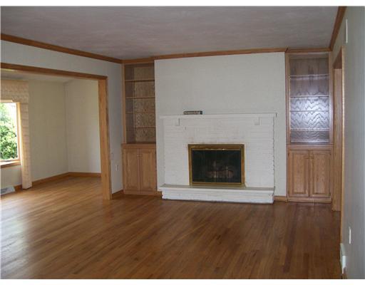 219 Country Club Road Butler, PA 16002 - Photo 9 of 18 Living Room. Gracious fireplace flanked by wall units
