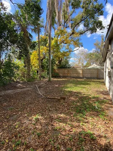 a view of a yard with an outdoor space