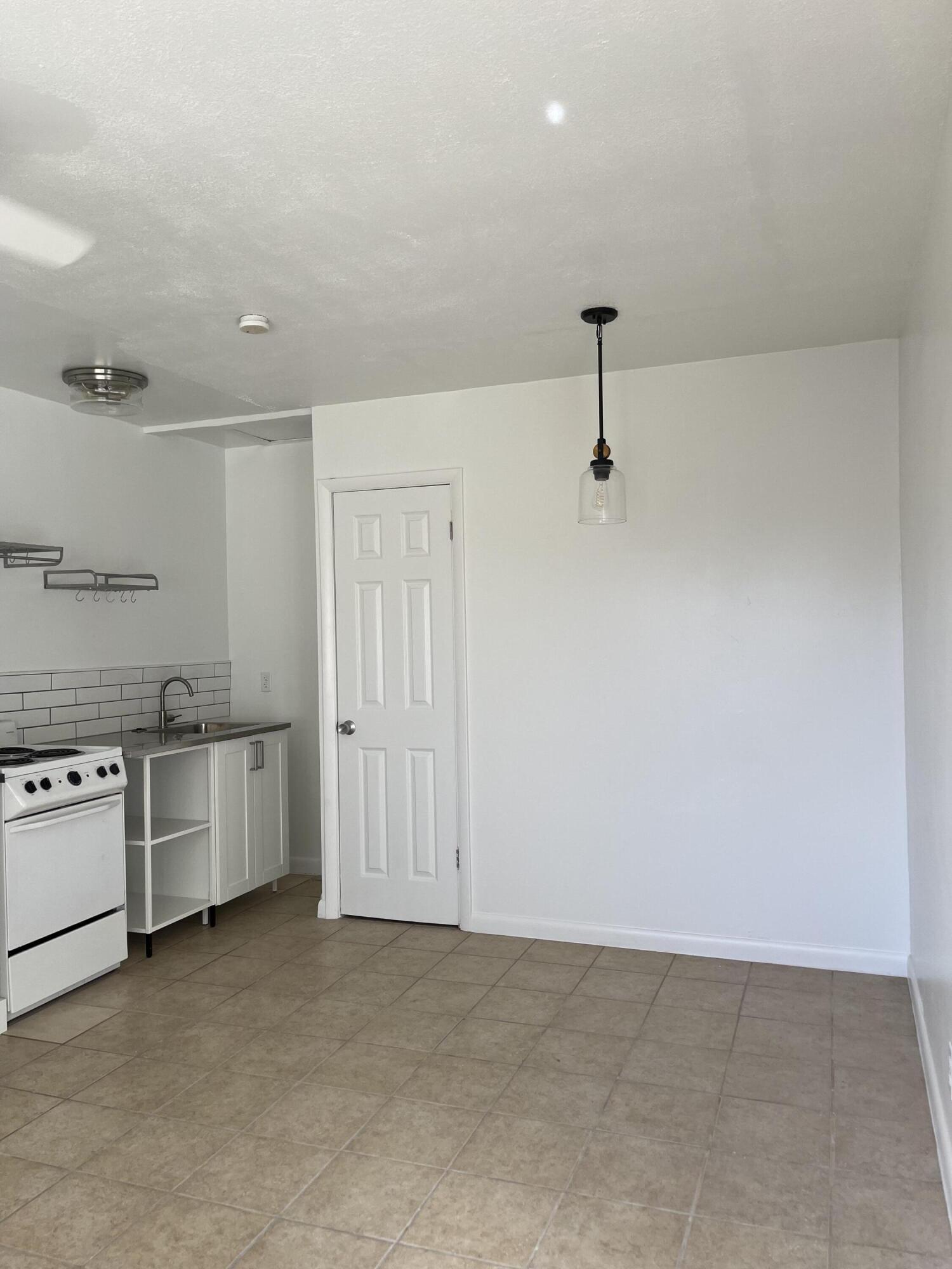 320 West Blue Heron Boulevard, Unit 2 Riviera Beach, FL 33404 - Photo 2 of 7 IMG_3460