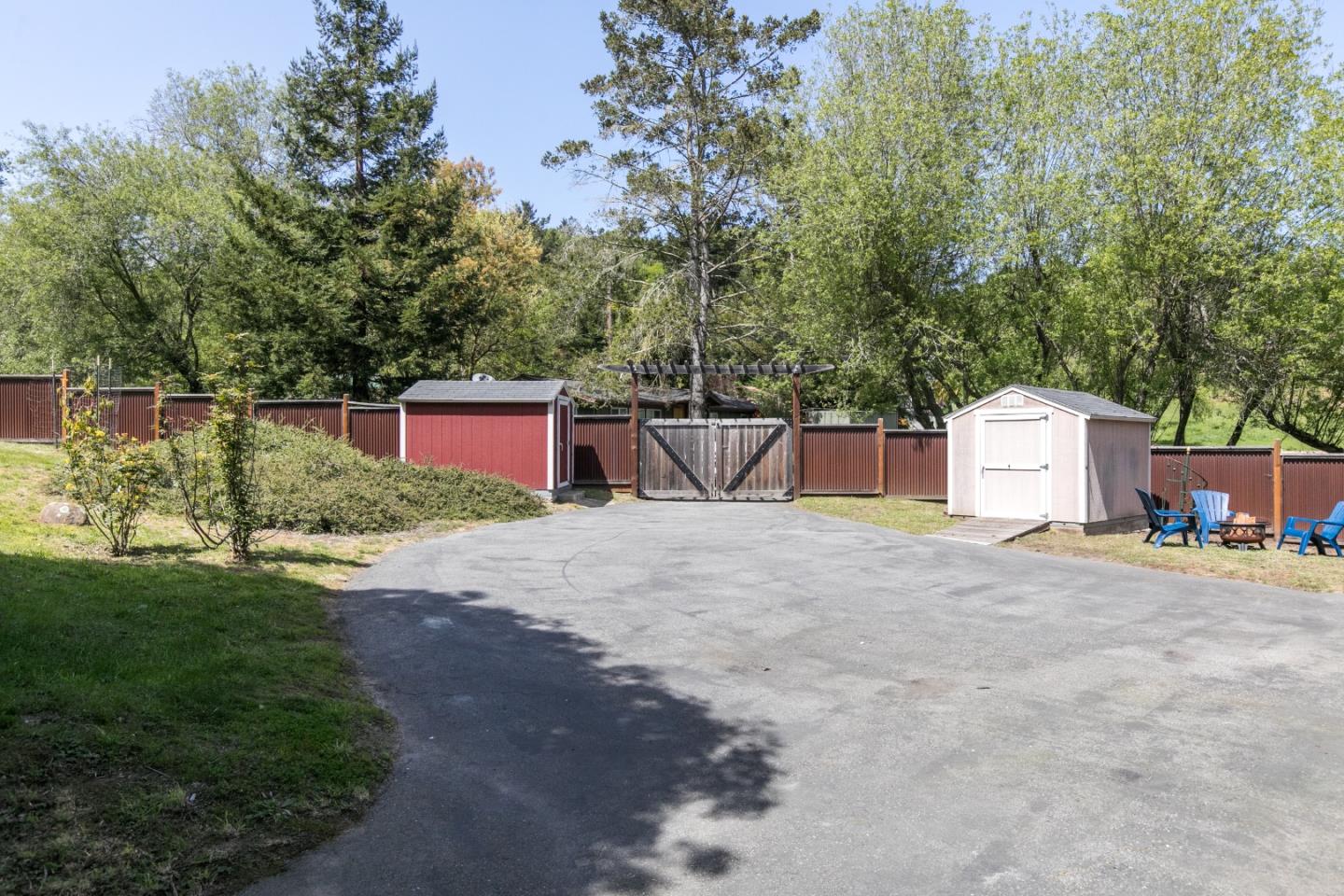 241 Bronco Road Soquel, CA 95073 - Photo 68 of 86 a front view of a house with a yard and garage