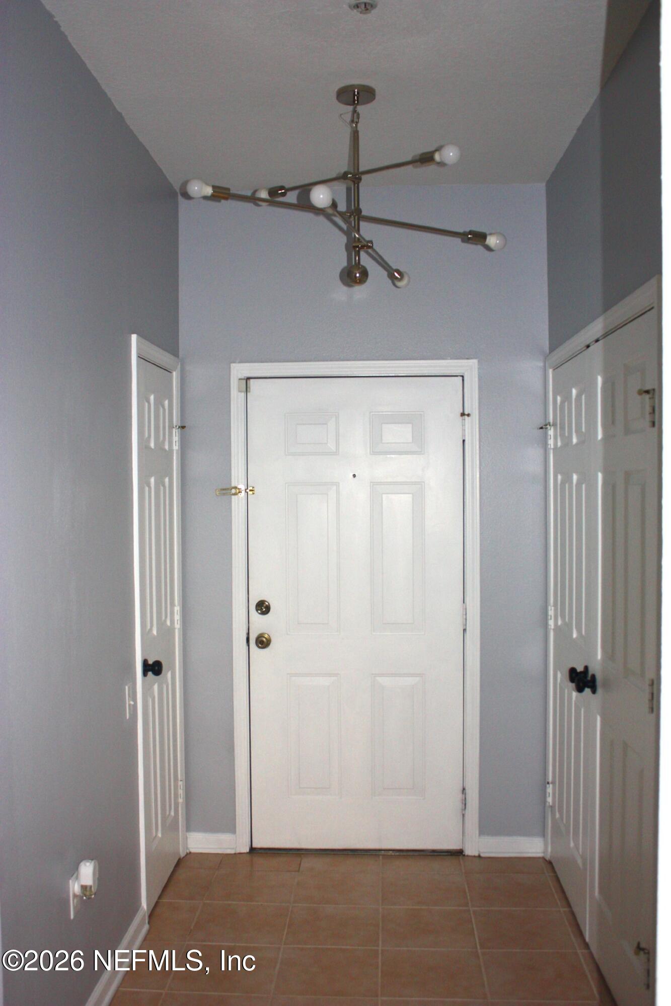 7990 Baymeadows Road East, Unit 530 Jacksonville, FL 32256 - Photo 18 of 21 a view of a hallway
