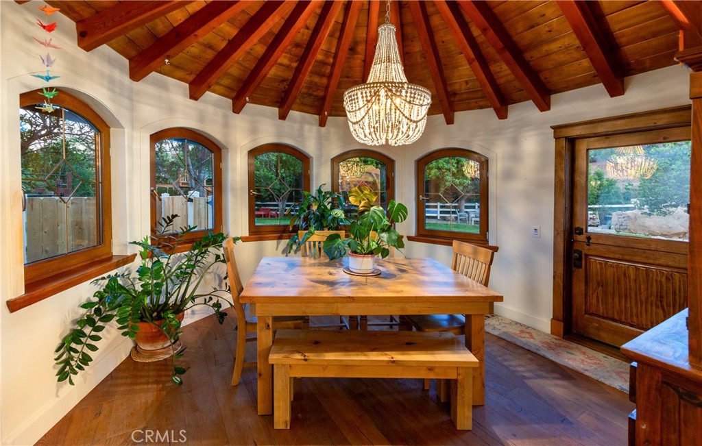 85 Saddlebow Road Bell Canyon, CA 91307 - Photo 15 of 75 a view of a dining room with furniture window and wooden floor