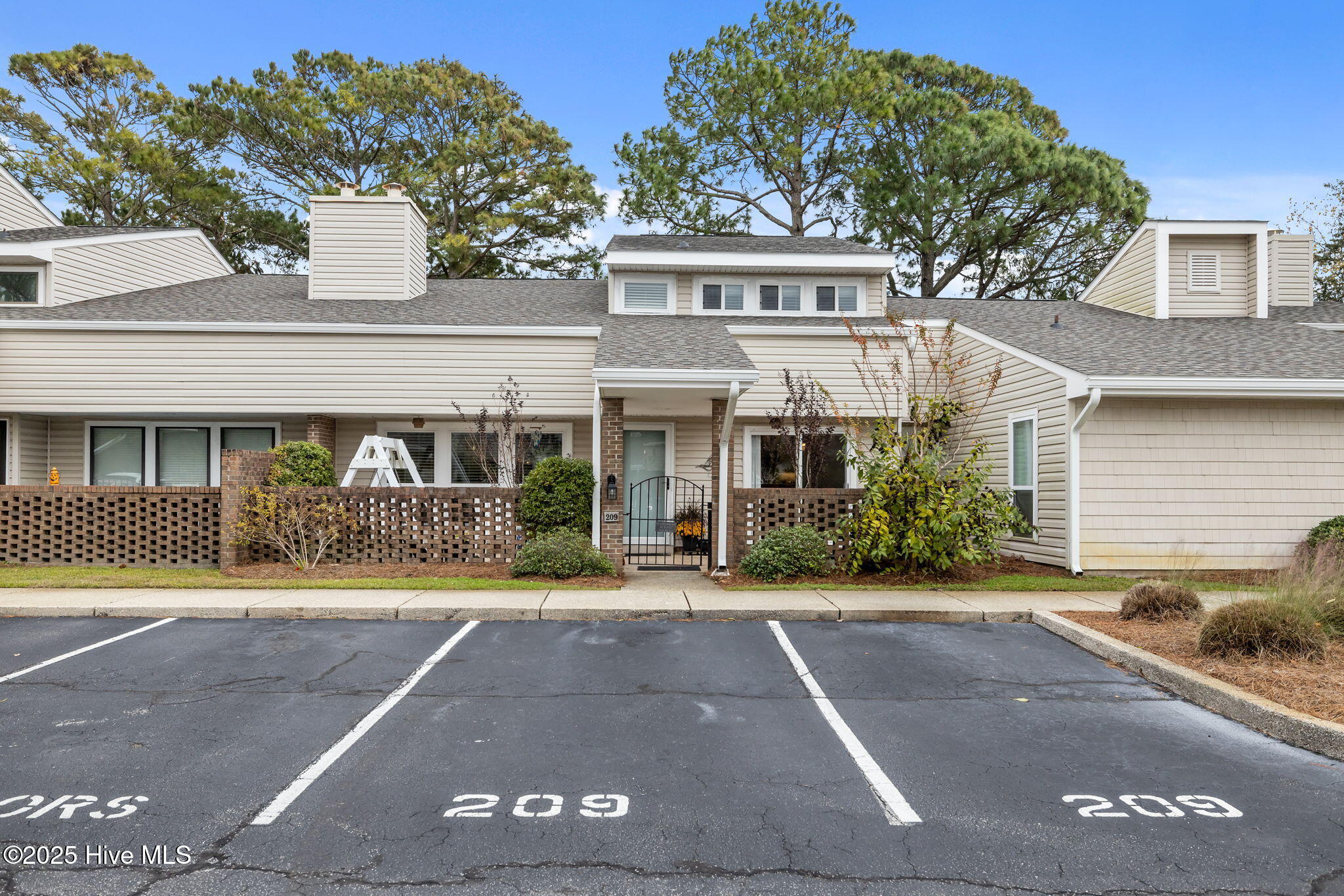 209 Sound Court Morehead City, NC 28557 - Photo 29 of 44 Front Elevation with Assigned Parking Spots