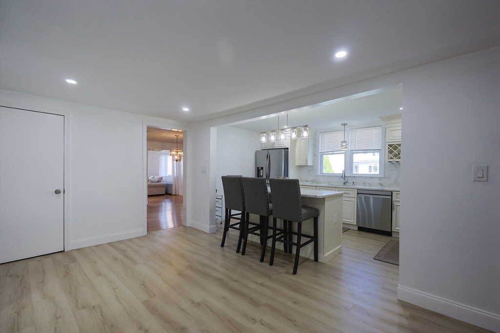 1245 North High Street Fall River, MA 02720 - Photo 11 of 28 a view of a dining room with furniture and wooden floor