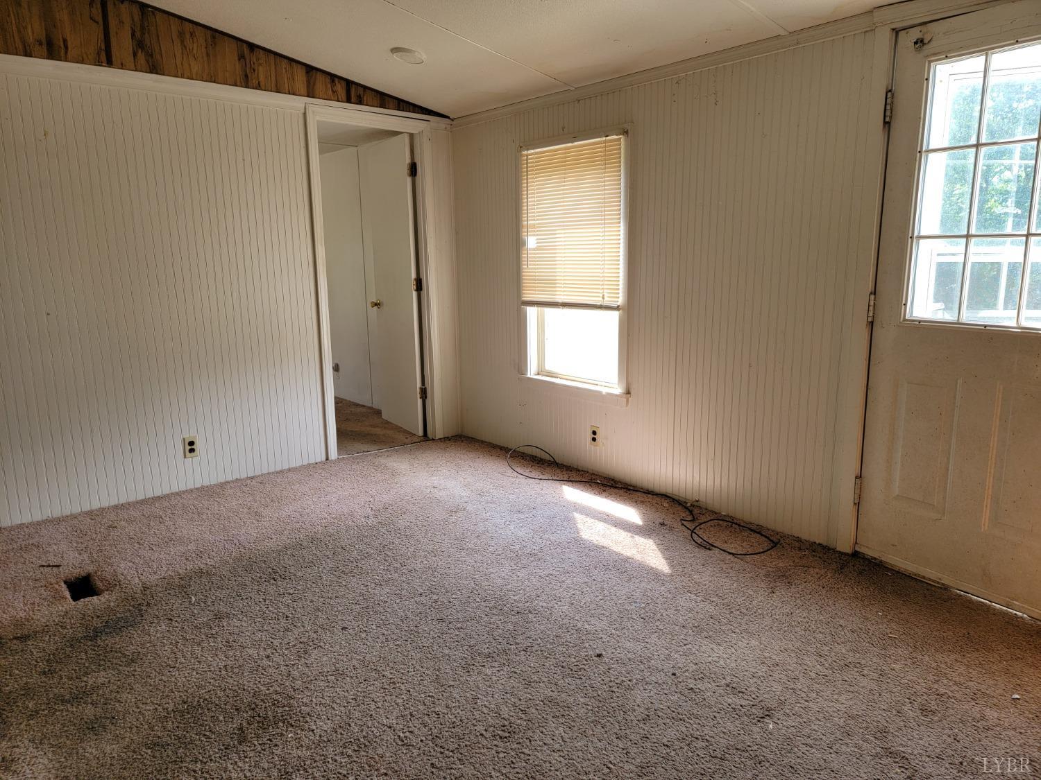 3310 Mountain Road Gretna, VA 24557 - Photo 3 of 15 an empty room with windows