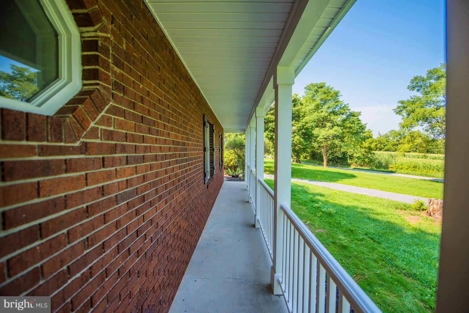434 Earle Road Charles Town, WV 25414 - Photo 7 of 29 Handsome front porch...sit awhile!