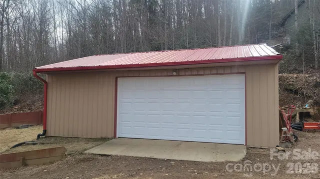 a view of a deck with a table and chairs
