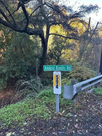 a sign that is on the side of the road